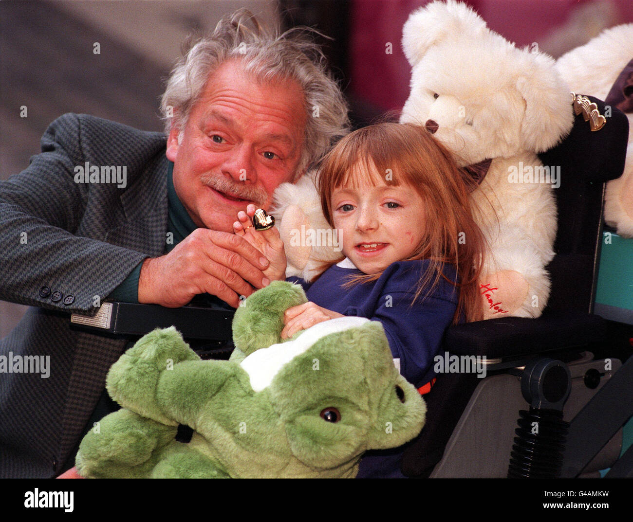 Actor David Jason with 11yearold Rebecca Roberts, who suffers from