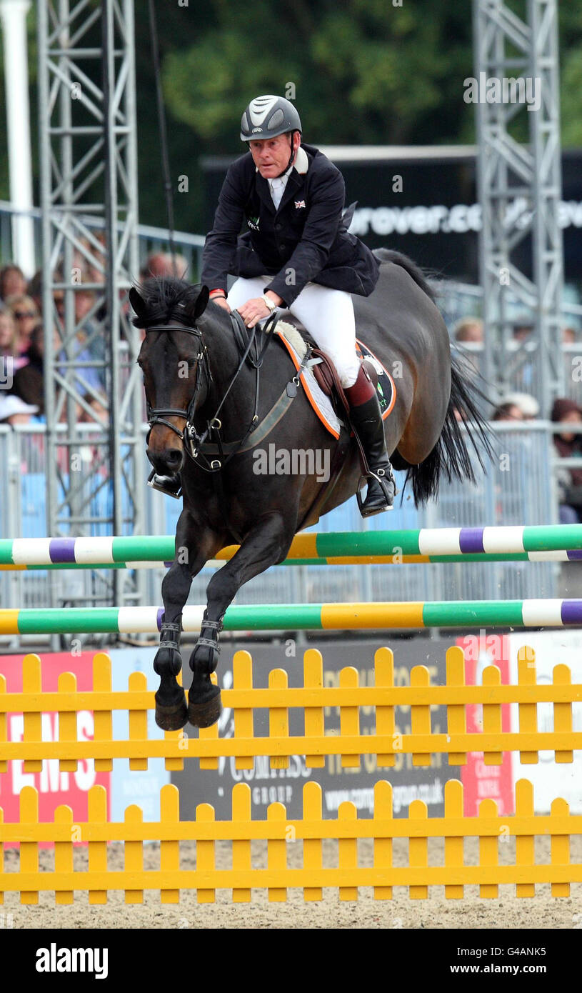 Tim Stockdale riding Fresh Direct Kalico Bay competes in the The Royal Windsor Grand Prix during day five of the Royal Windsor Horse Show at The Royal Mews, Windsor Castle, London. Stock Photo