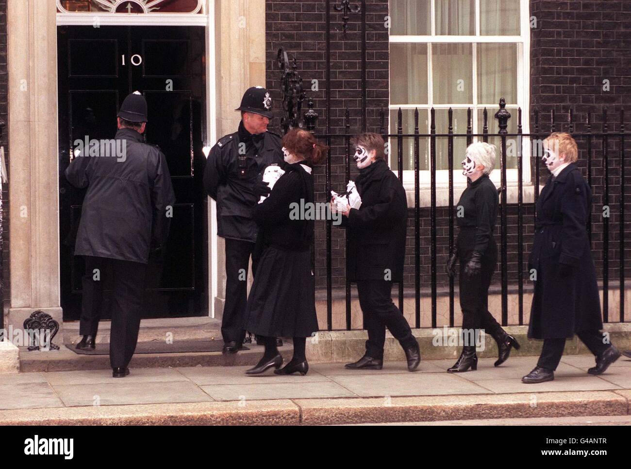 A 'funeral cortege' of concerned parents from Shrewsbury, Shropshire, deliver a petition to No10 Downing Street today (Friday), condemning huge cuts made to the county's education budget. Photo by Stefan Rousseau/PA Stock Photo