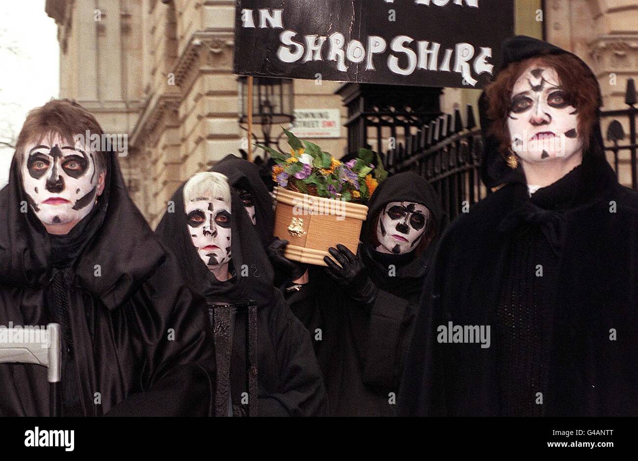 A 'funeral cortege' of concerned parents from Shrewsbury, Shropshire, deliver a petition to No10 Downing Street today (Friday), condemning huge cuts made to the county's education budget. Photo by Stefan Rousseau/PA Stock Photo
