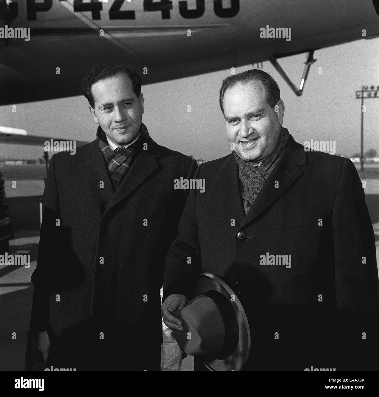 PA NEWS PHOTO 14/2/61 TWO OF THE WORLD'S GREATEST VIOLINISTS DAVID OISTRAKH AND HIS SON IGOR AT LONDON'S HEATHROW AIRPORT ARRIVING FROM MOSCOW TO MAKE THEIR FIRST JOINT APPEARANCE AT CONCERT OUTSIDE THE USSR Stock Photo