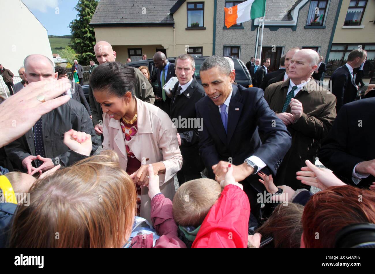 US President Barack Obama and his wife Michelle greet well wishers in Moneygall, County Offaly, during his visit to Ireland. Stock Photo