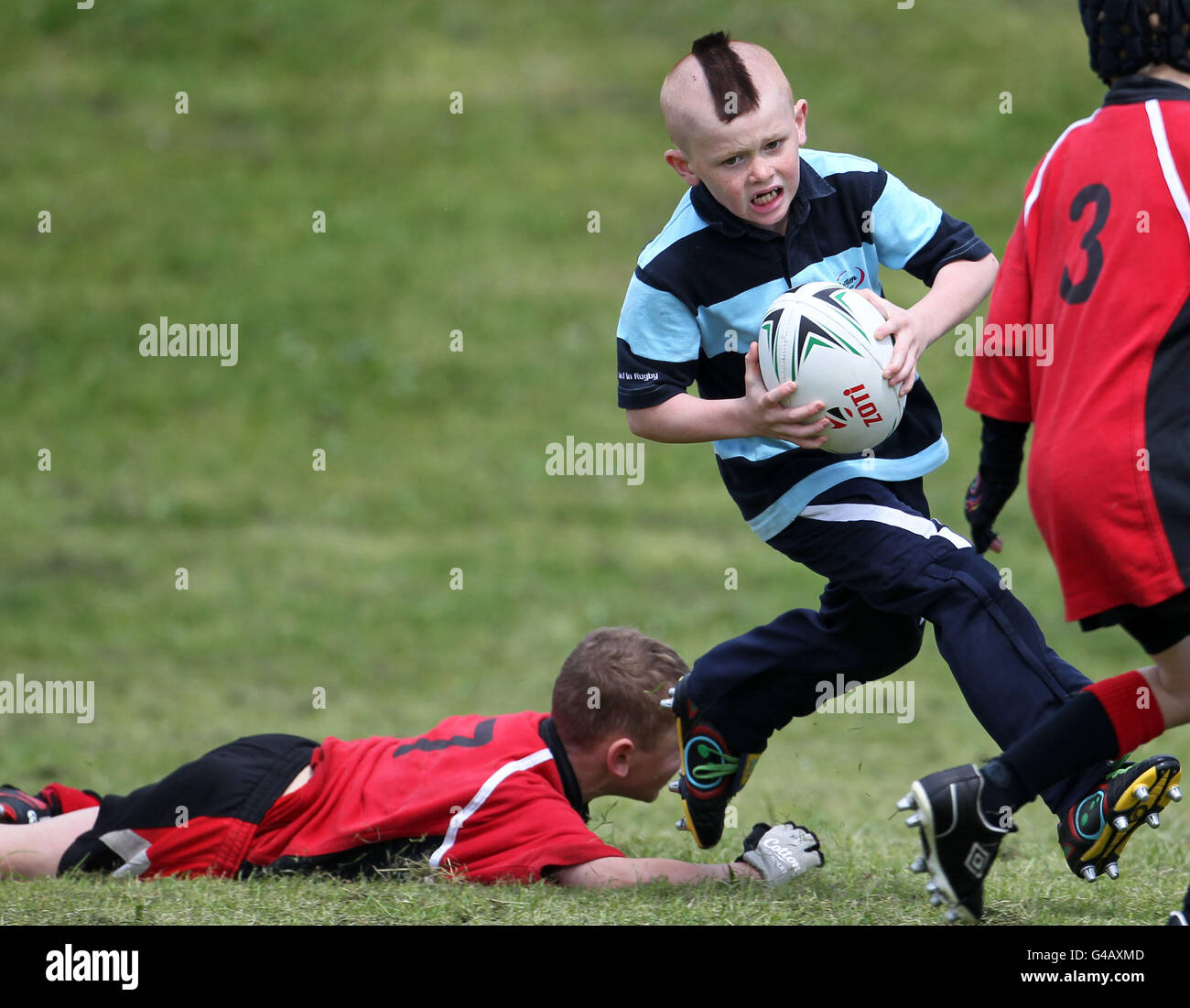 Kids enjoy playing rugby during the Forrester Mini Tournament at ...