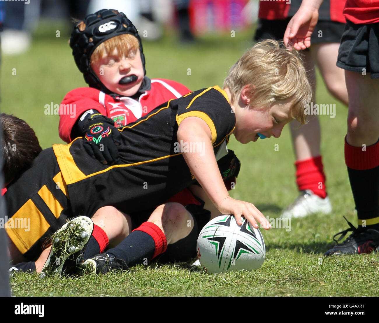 Kids enjoy playing rugby during the Forrester Mini Tournament at ...