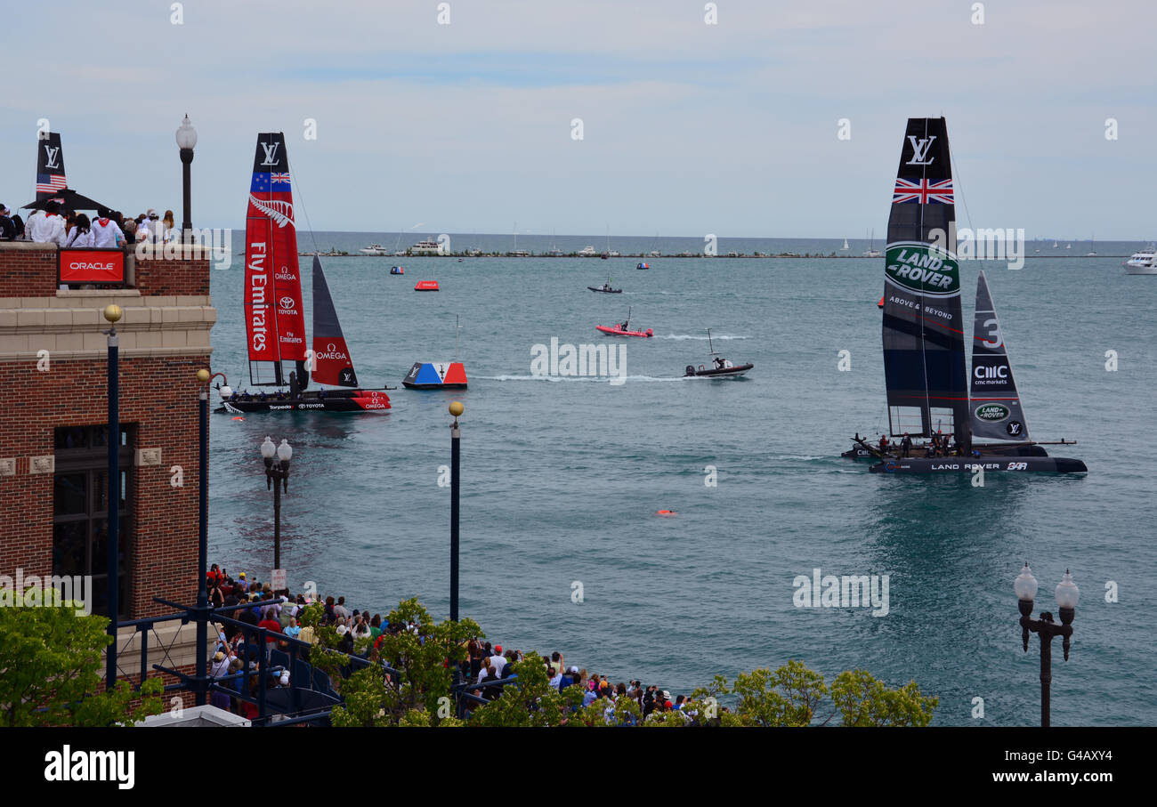 Team Land Rover Great Brittan and Team Emirates New Zealand race during America's Cup 2016 series in Chicago off Navy Pier Stock Photo