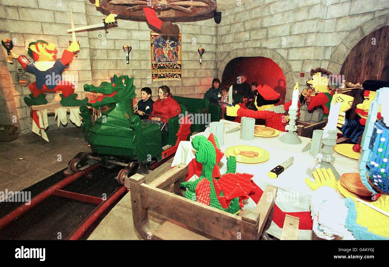 Some young visitors to Legoland in Windsor today (Thursday) test out the new roller-coaster, Dragon Ride, as it snakes through the inside of the Dragon Knight's Castle at the beginning of its journey. Photo Tim Ockenden/PA Stock Photo