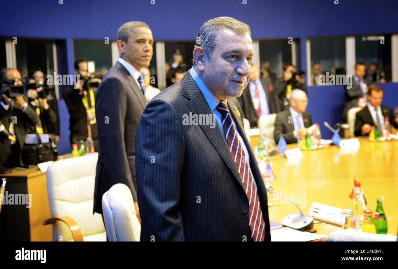 Prime Minister of Egypt Essam Sharaf (right) and US President Barack Obama attend a meeting with G8 leaders and newly appointed Arab leaders at the G8 summit in Deauville, France, where they discussed recent changes in the Middle East and North Africa region. Stock Photo