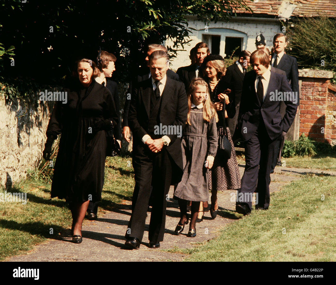 PA NEWS PHOTO 6/9/79 MOURNERS AT THE CHURCH OF ST. JOHN THE BAPTIST AT MERSHAM, NEAR ASHFORD, KENT FOR THE FUNERAL OF THE DOWAGER LADY BRABOURNE (82) AND 14 YEAR OLD NICHOLAS KNATCHBULL BOTH VICTIMS OF THE BOMB OUTRAGE WHICH ALSO CLAIMED THE LIFE OF LORD MOUNTBATTEN. IN FOREGROUND ARE LADY PAMELA HICKS, DAUGHTER OF LORD MOUNTBATTEN AND HER HUSBAND DAVID HICKS Stock Photo