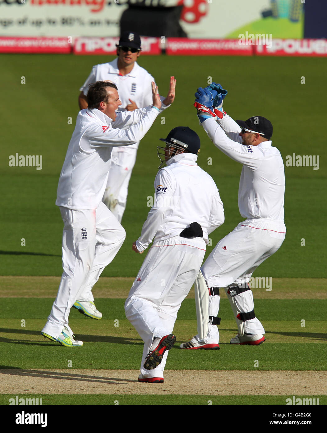 England's Graeme Swann (left) celebrates clean bowling Sri Lanka's Tillakaratne Dilshan (not in picture) Stock Photo