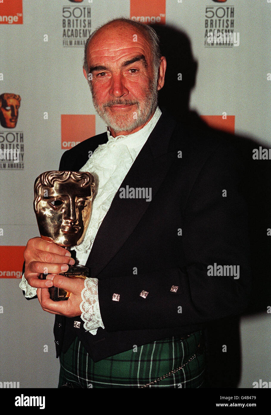 ACTOR SEAN CONNERY WITH HIS FELLOWSHIP AWARD AT THE 50TH BAFTA AWARDS IN LONDON * 2/4/2001: Sir Sean Connery who is set to join forces with Scotland's First Minister to persuade America that the country is 'open for business' despite the foot-and-mouth crisis it was revealed. The former James Bond star has been recruited by Henry McLeish to spearhead a drive to restore confidence in Scotland as a tourist destination during Tartan Week celebrations in the US. Stock Photo