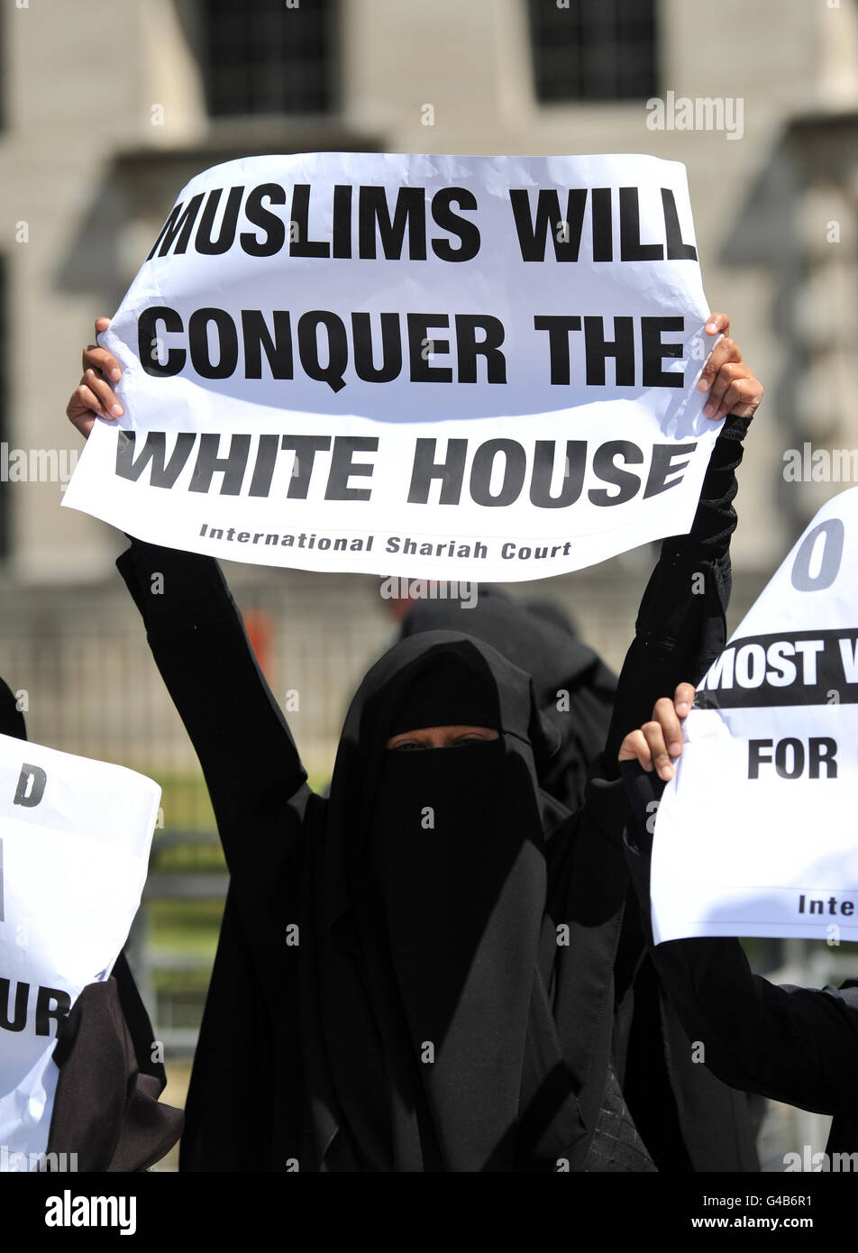Protestors stand outside Downing Street as Barack Obama embarks on a three-day state visit to the UK. Stock Photo