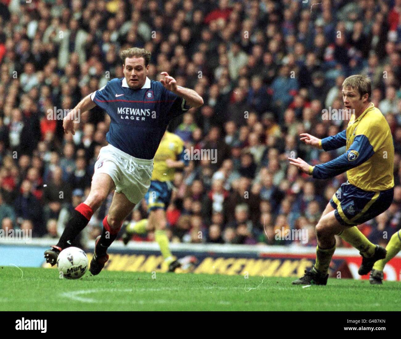 Ranger's Paul Gascoigne in action during this afternoon's (Saturday) Bells's Scottish League clast against St.Johnstone at Ibrox. Rangers defeated St. Johnstone 2-1. Photo by Chris Bacon/PA Stock Photo