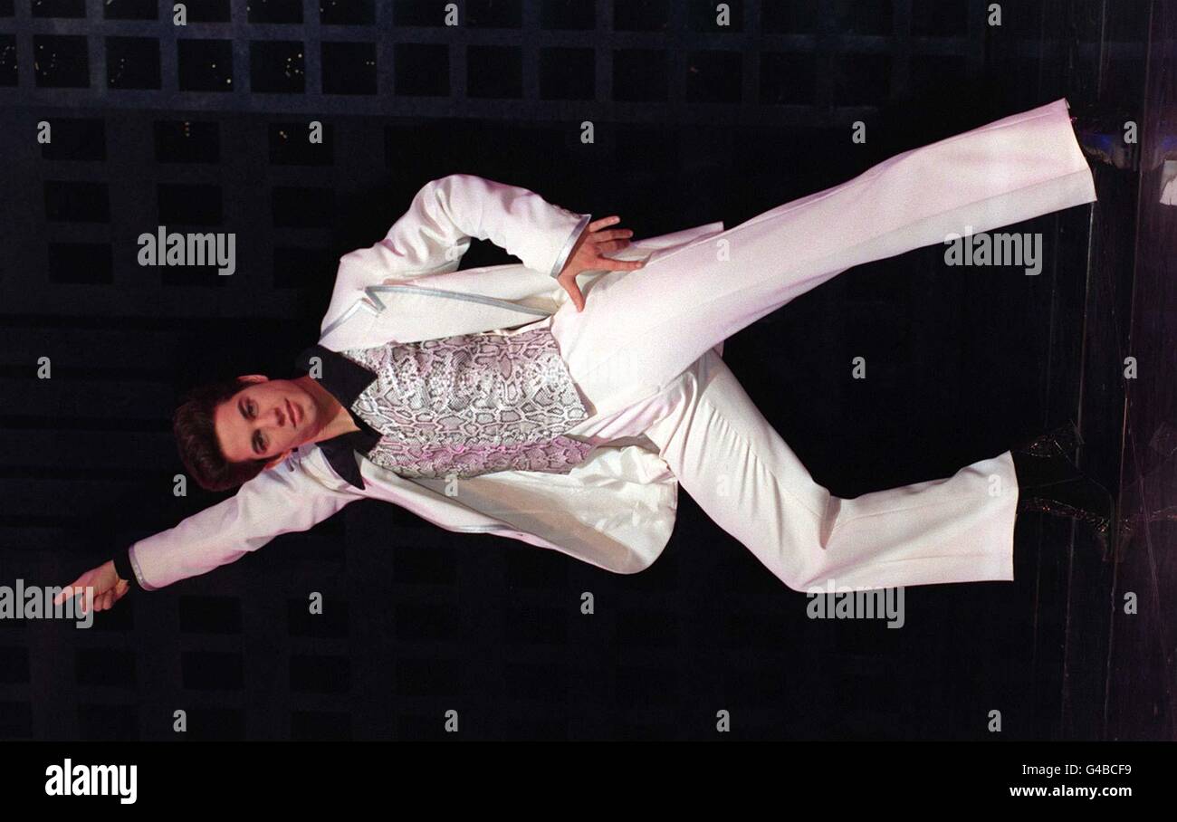 Saturday Night Fever' star Tony Manero played by Adam Garcia poses for the media during a photocall in London this morning (Thursday) prior to the opening of 'Saturday Night Fever' at the London Palladium on Tuesday 5th May. Photo by Fiona Hanson/PA. Stock Photo