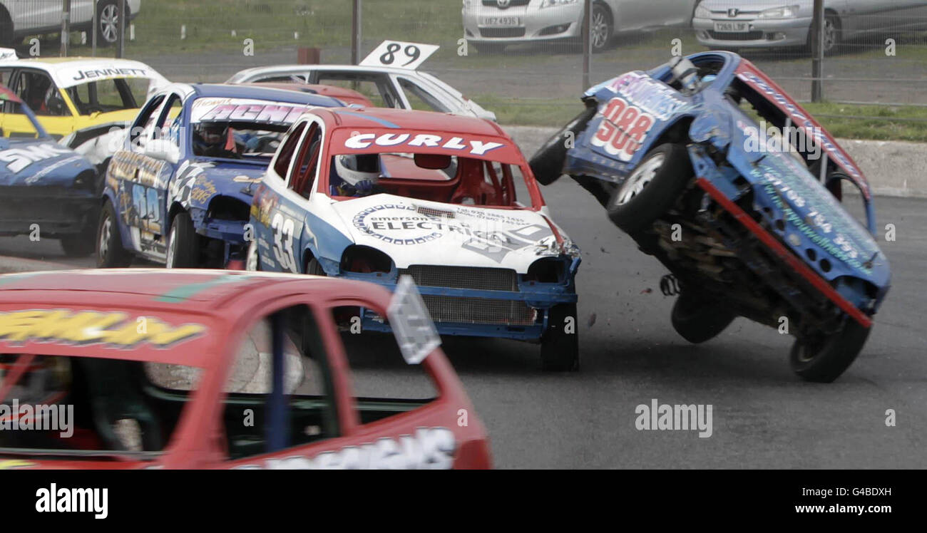 A car is overturned in the opening heat of the ProStock stock car racing event at Nutts Corner