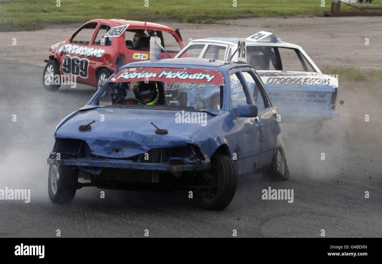Cars collide in the opening heat of the prostock stock car racing event at Nutts Corner in