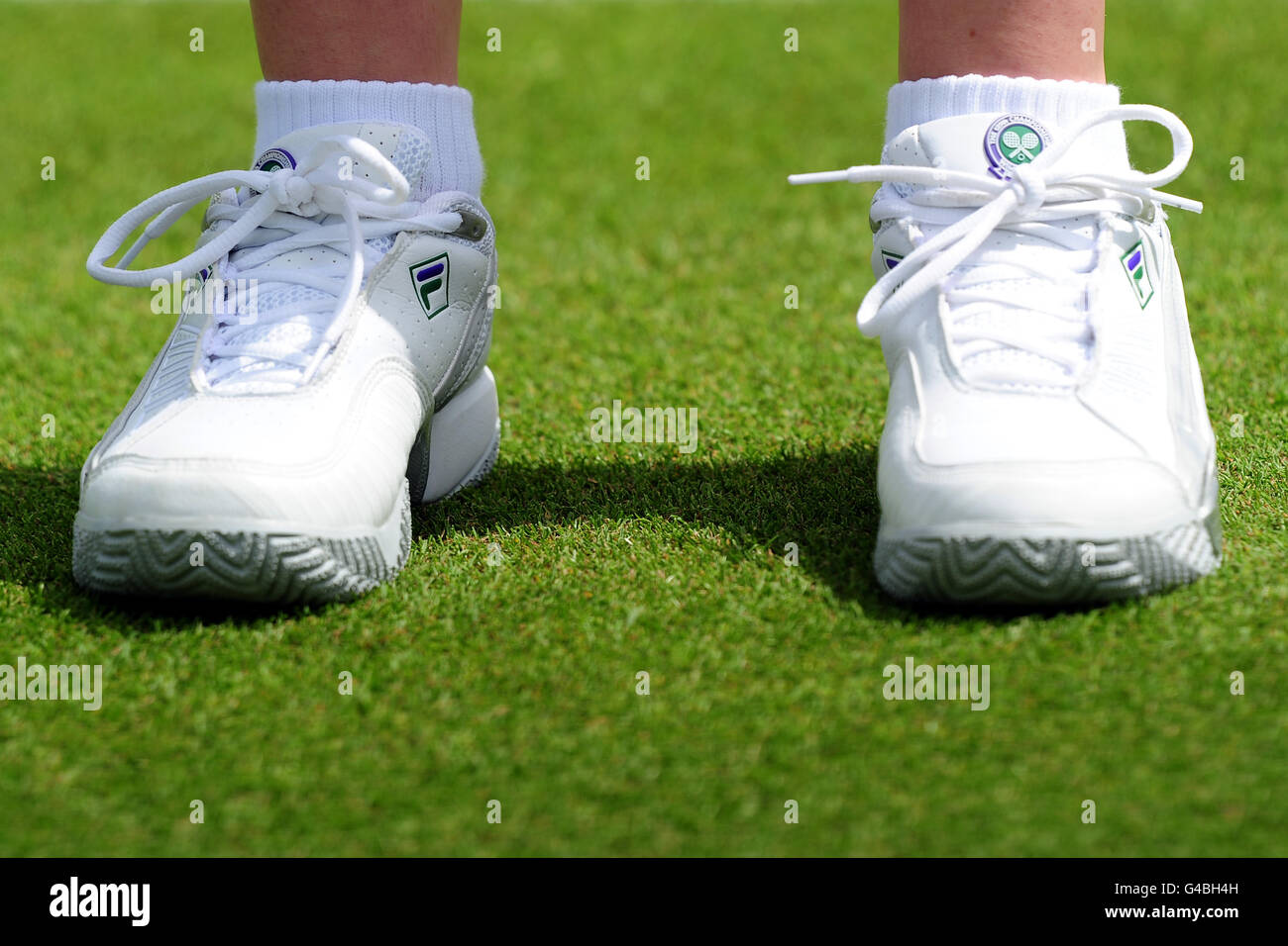 Tennis - 2011 Wimbledon Championships - Day Two - The All England Lawn Tennis and Croquet Club. The trainers of a ball girl during day two of the 2011 Wimbledon Championships at the All England Lawn Tennis and Croquet Club, Wimbledon. Stock Photo