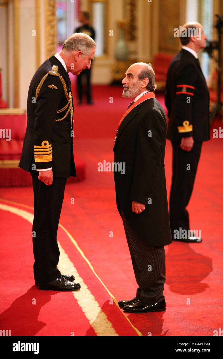 Actor David Suchet is presented with his CBE by the Prince of Wales, at the Investiture Ceremony in Buckingham Palace in central London. Stock Photo