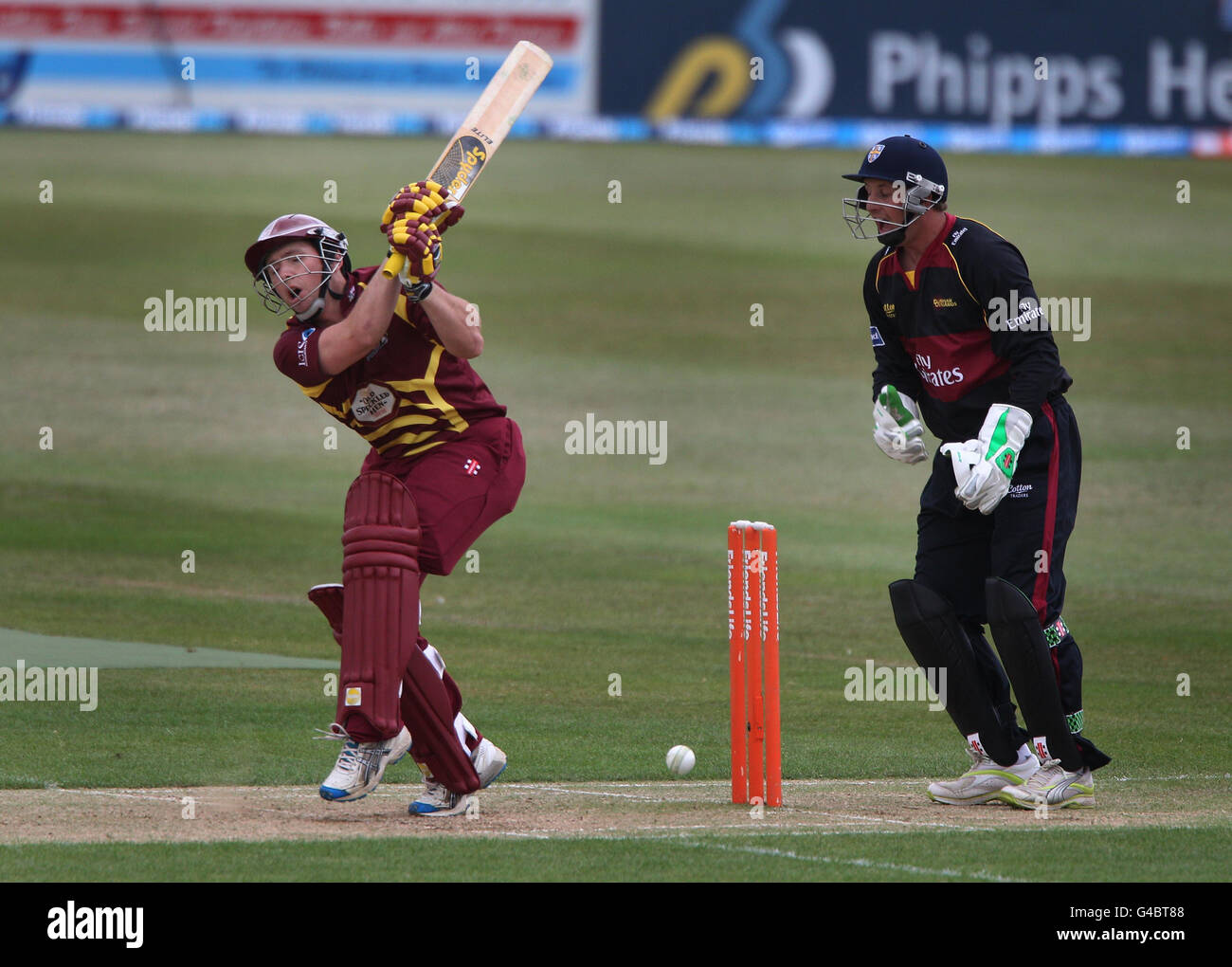 Northamptonshire Steelbacks batsman Rob White is trapped LBW by Durham's bowler Paul Collingwood, watched by wicketkeeper Phil Mustard (right) during the Friends Life T20 North Group match at the County Ground, Northamptonshire. Stock Photo