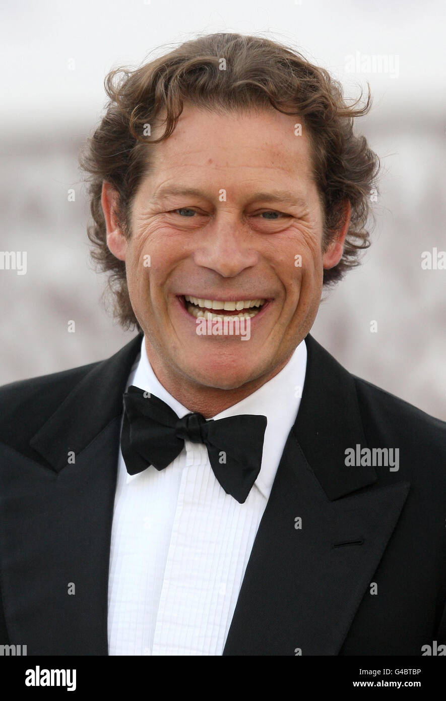 Founding Chairman of ARK Arpad Busson arrives at the 10th annual ARK (Absolute Return for Kids) Gala Dinner, at Kensington Palace, in Kensington, London. Stock Photo