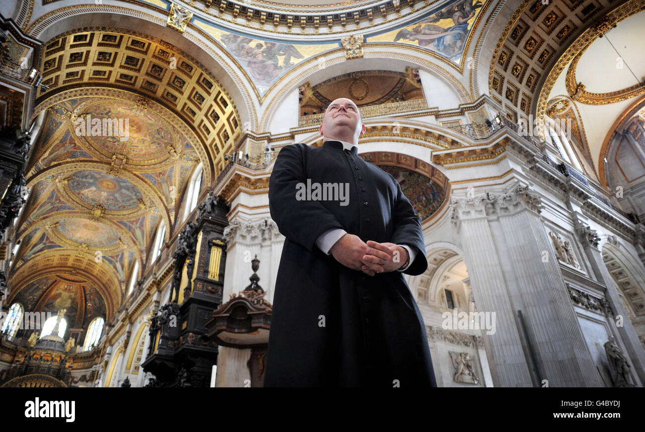 Canon Mark Oakley is pictured inside St Paul's Cathedral in London which is celebrating its first day without scaffolding for 15 years after a 40 million restoration project. Stock Photo
