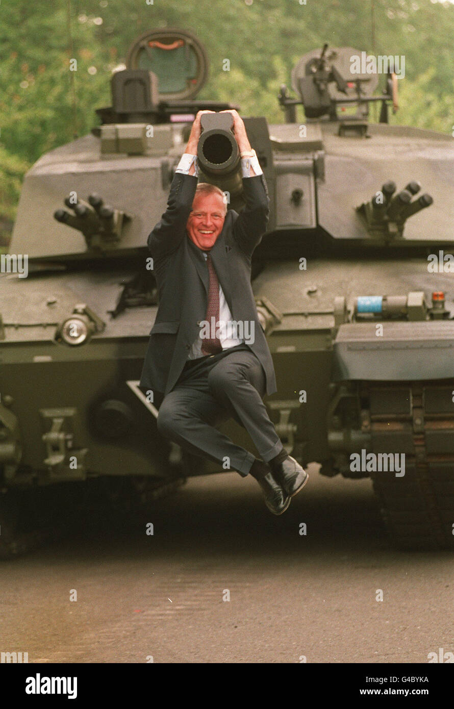 SIR COLIN CHANDLER, CHIEF EXECUTIVE OF VICKERS PLC, SHOWS HIS PLEASURE AFTER TAKING THE WRAPS OFF THE CHALLENGER 2 TANK AT CHELSEA BARRACKS IN LONDON. * 20/9/99 It was announced that aero-engines company Rolls-Royce had made an agreed cash offer of 576 million for the Vickers engineering group. As well as defence systems, Vickers also has marine and turbine divisions. Stock Photo