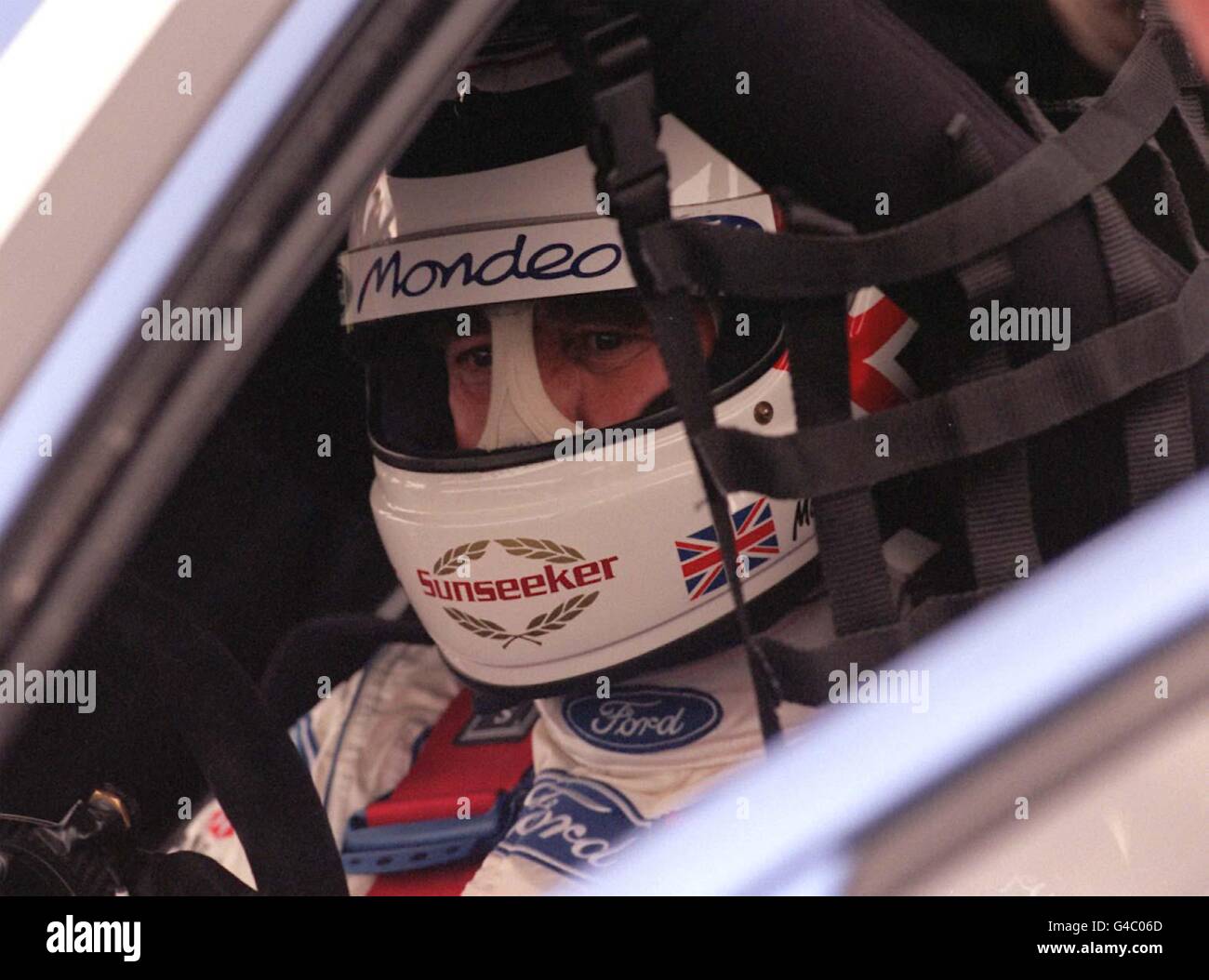 Former Formula One Champion Nigel Mansell found himself back in the driving seat, driving a Ford Mondeo at Donington Park today for rounds 11 & 12 of the Auto Trader RAC British Touring Car Championship. Photo by Derek Cox/PA Stock Photo