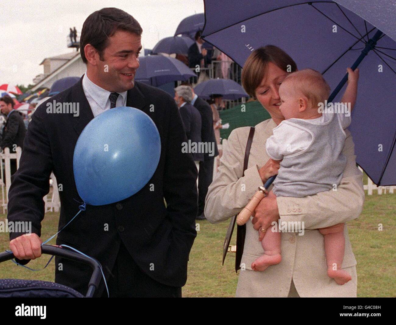 Former England rugby captain Will Carling and his girlfriend Ali Cockayne and their nine-month-old son Henry, enjoying a day out at the Alfred Dunhill Queen's Cup Polo at Smith's Lawn, Windsor Great Park. Stock Photo