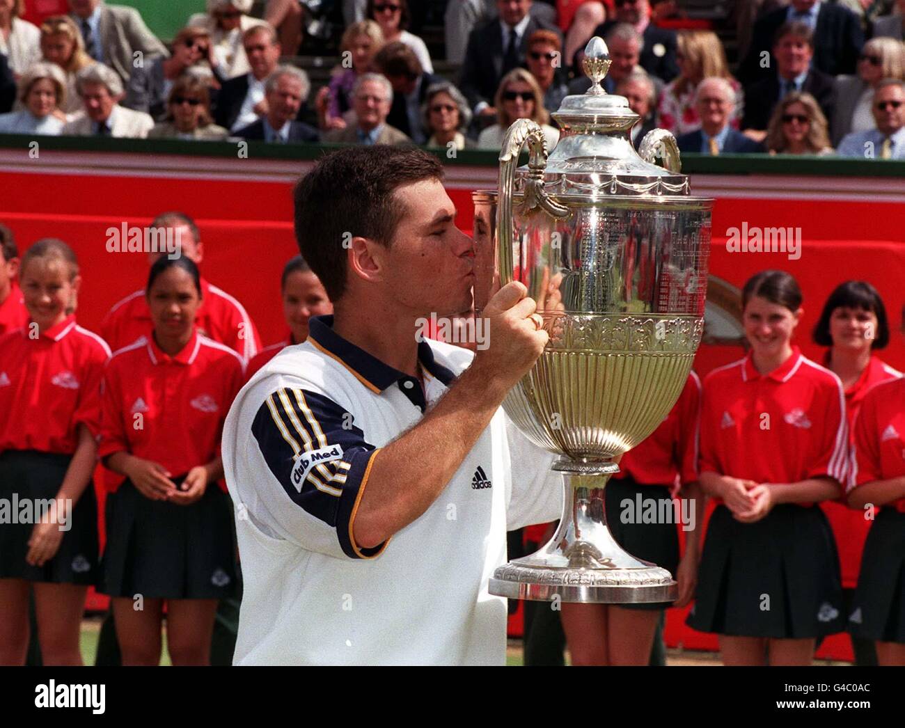 Australian Scott Draper kisses the Stella Artois trophy after defeating Italian Laurence Tieleman in the final of the championship at Queen's Tennis Club in London today (Sunday). Photo by Michael Stephens/PA Stock Photo