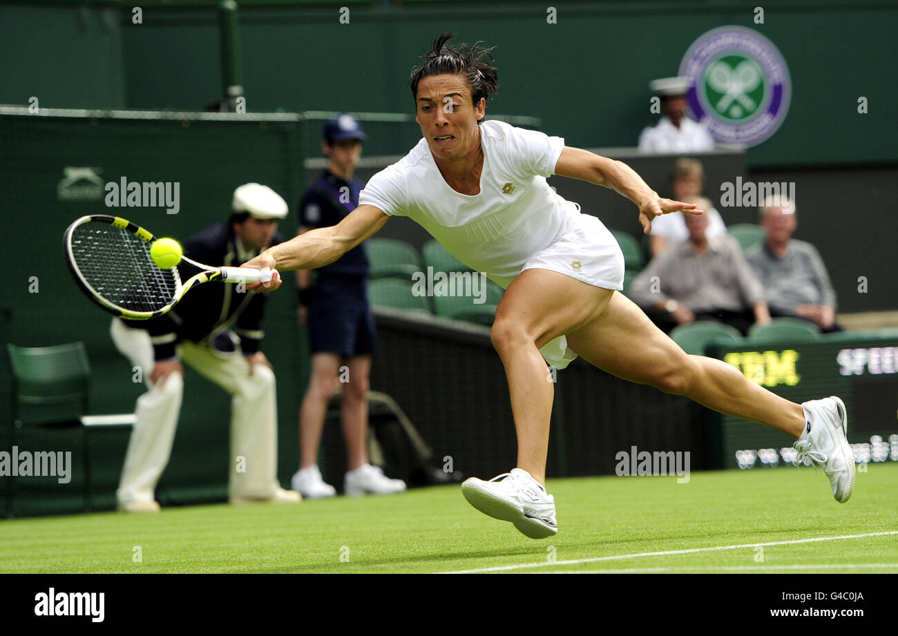 Italy's Francesca Schiavone in action against Australia's Jelena Dokic during day one of the 2011 Wimbledon Championships at the all England Lawn Tennis and Croquet Club, Wimbledon. Stock Photo
