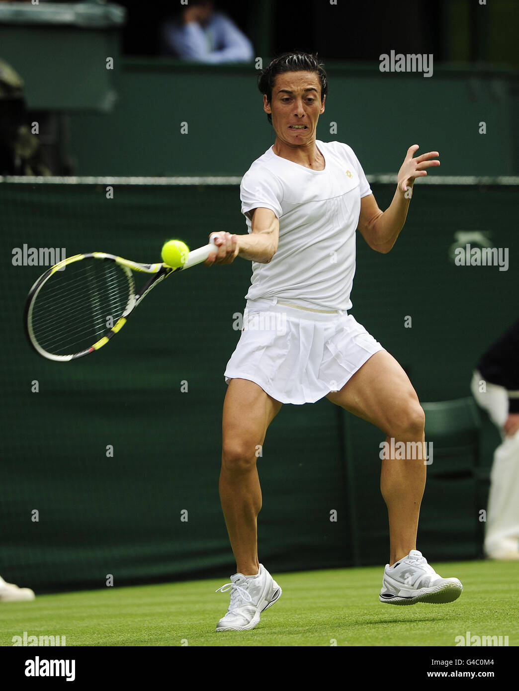 Italy's Francesca Schiavone in action against Australia's Jelena Dokic during the 2011 Wimbledon Championships at the all England Lawn Tennis and Croquet Club, Wimbledon. Stock Photo