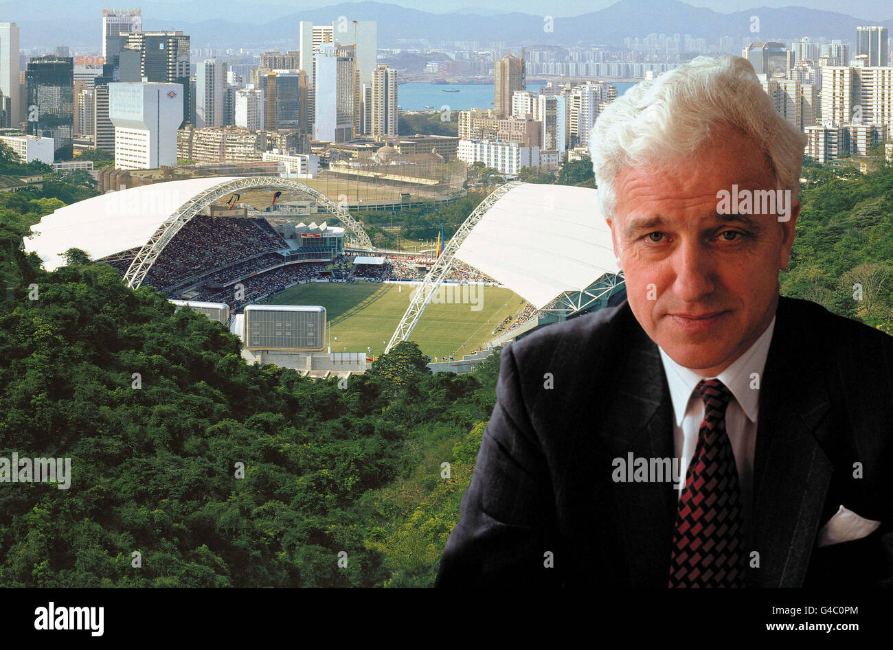 The new Hong Kong Stadium constructed from British Steel in the background with (inset) Sir Brian Moffat, Chairman & Chief Executive of British Steel plc, whose results are announced today (Monday). British Steel is fighting back with a 3-part strategy to restore the Company's competitiveness, in response to the adverse effects of the strength of Sterling and the economic crises in the Far East. Photo PA. Stock Photo
