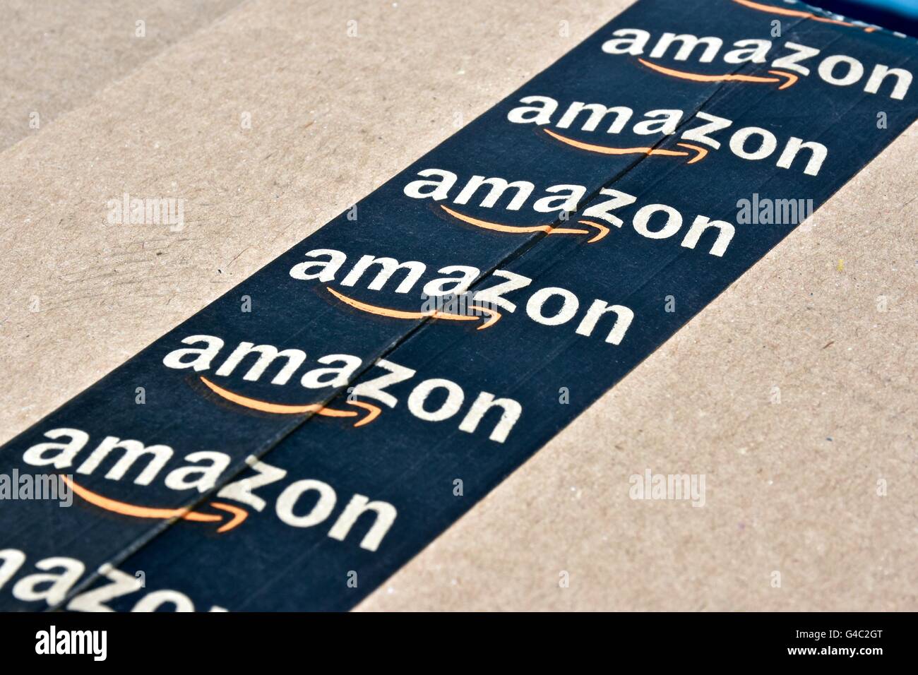 An Amazon Prime box with Amazons signature tape Stock Photo Alamy