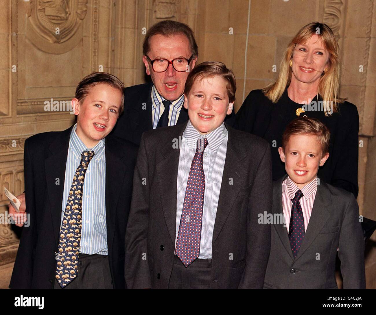 Sir David and Lady Carina Frost and their three son's (l/r) Wilfred, Miles and George, arriving for the conert of Lord Andrew lloyd Webber's music to celebrate the composer's 50th birthday at the Royal Albert Hall in london this evening (Tuesday). Photo by Neil Munns/PA. Stock Photo