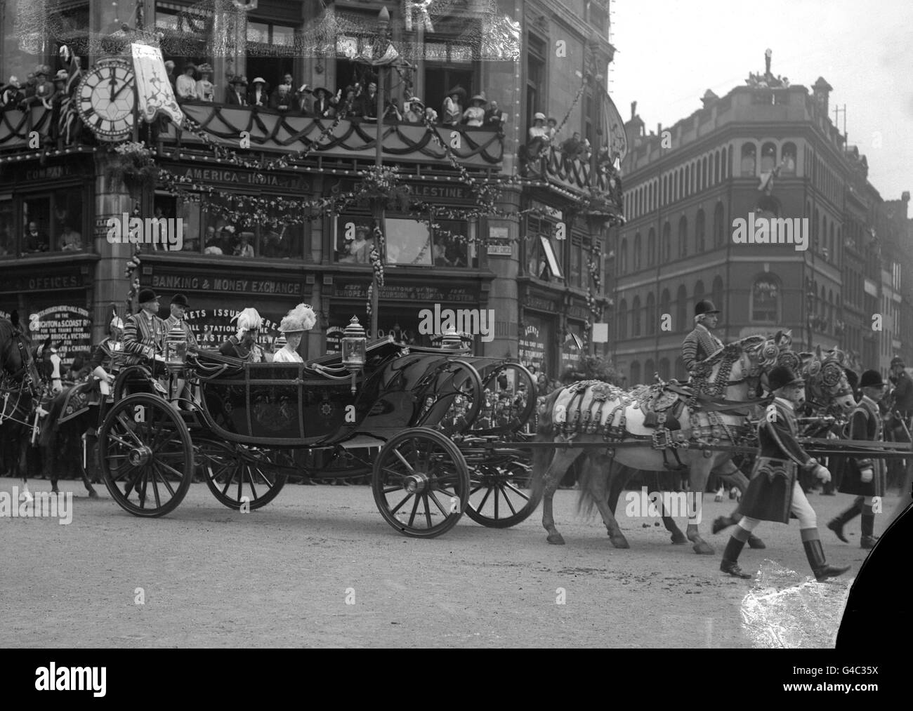King George V and Queen Mary passing through Ludgate Circus on their drive through London on the day after the Coronation. *Damaged Negative* Stock Photo