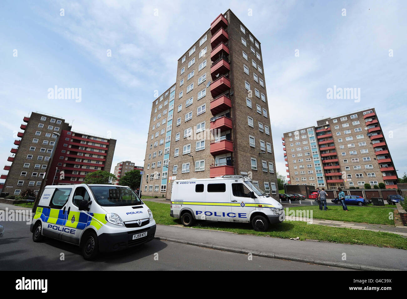 Police at Lindsey Mount flats in Leeds, where a 6-year-old boy fell to his death yesterday. Stock Photo