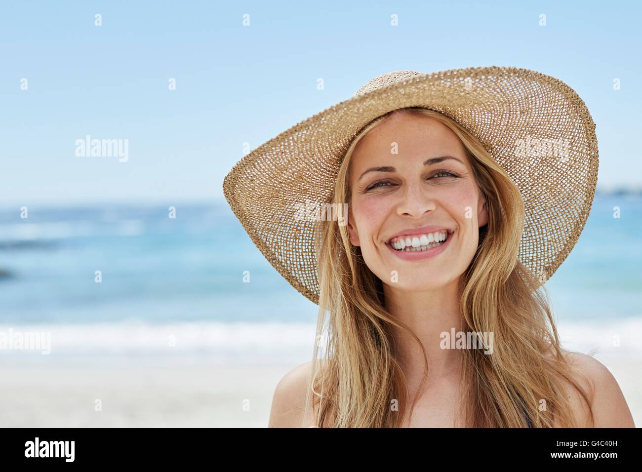 Person wearing a sunhat hi-res stock photography and images - Alamy