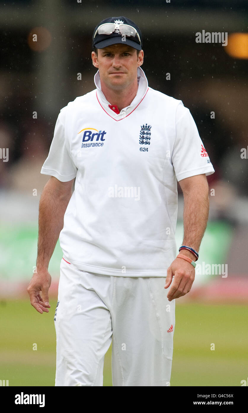 England captain Andrew Strauss leaves the field as rain stops play ...