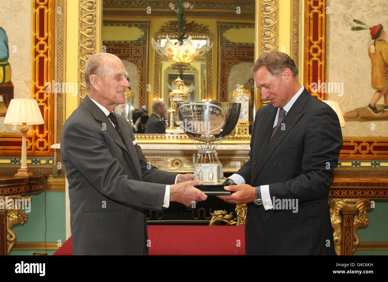 The Duke of Edinburgh presents the Aero Club Cup to David Hempleman-Adams, at a reception at Buckingham Palace, in central London. Stock Photo