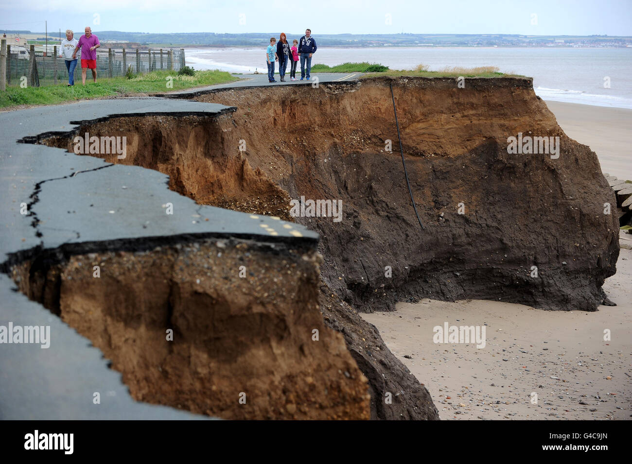 STANDALONE Photo. A cliff road in Skipsea, East Yorkshire, which has nearly completely washed away from coastal erosion. Stock Photo