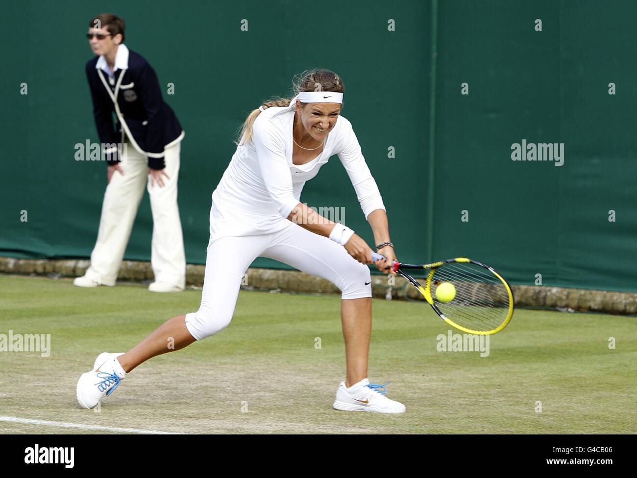 Belarus' Victoria Azarenka in action against Czech Republic's Iveta Benesova on day three of the 2011 Wimbledon Championships at the All England Lawn Tennis and Croquet Club, Wimbledon. Stock Photo
