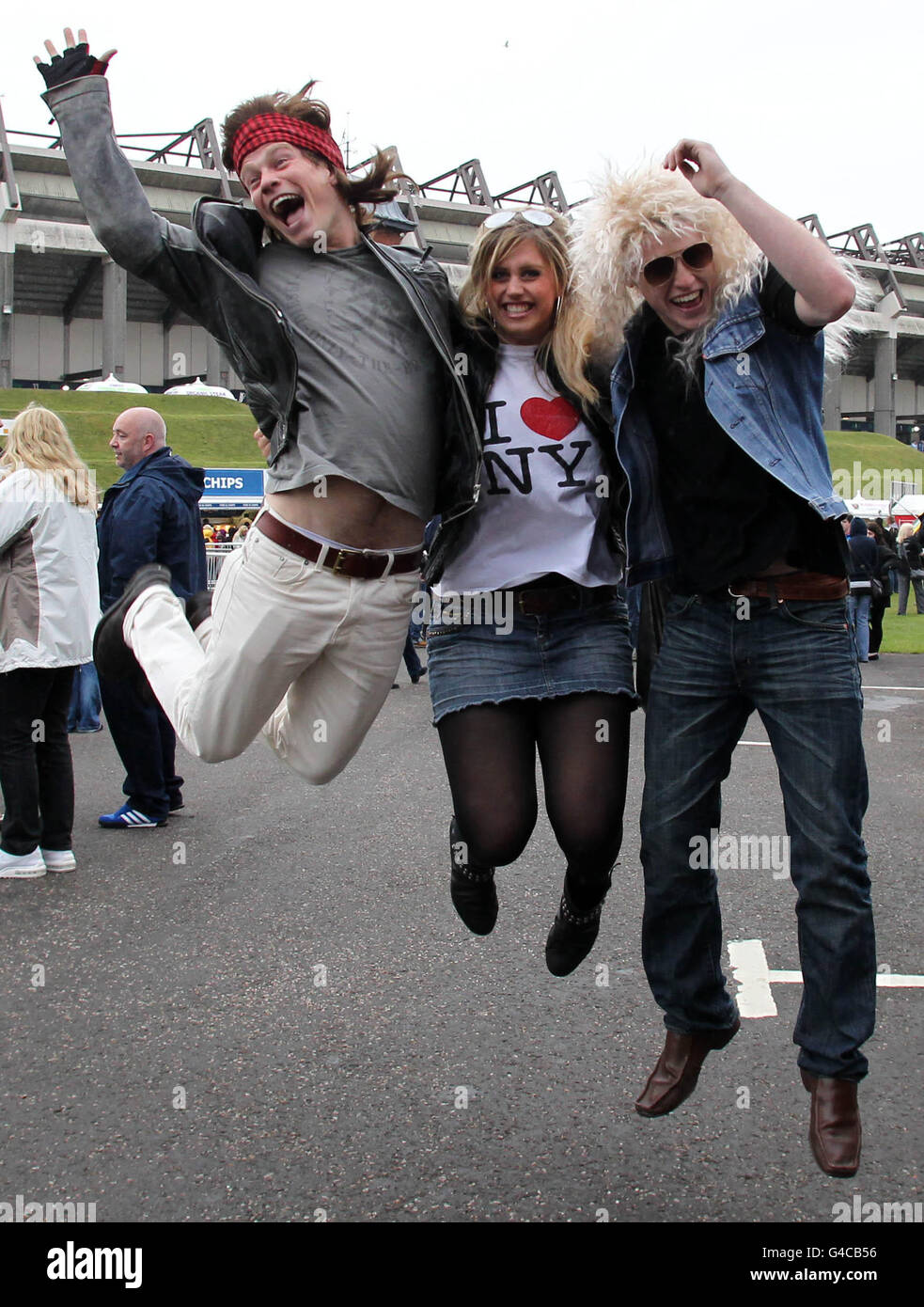 Bon Jovi gig - Murrayfield. Bon Jovi Fans (from left) Wim Stevenston, Laura McGhie and James Forster get ready for the gig at Murrayfield Stock Photo