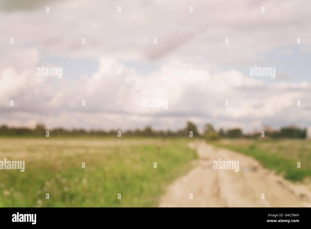 blurred background of dirt rural road Stock Photo