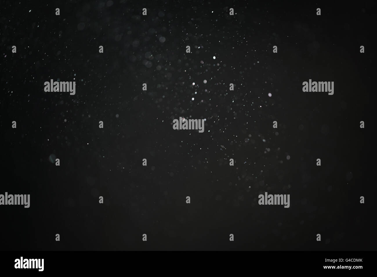 dust particles overblack background fx backdrop Stock Photo - Alamy