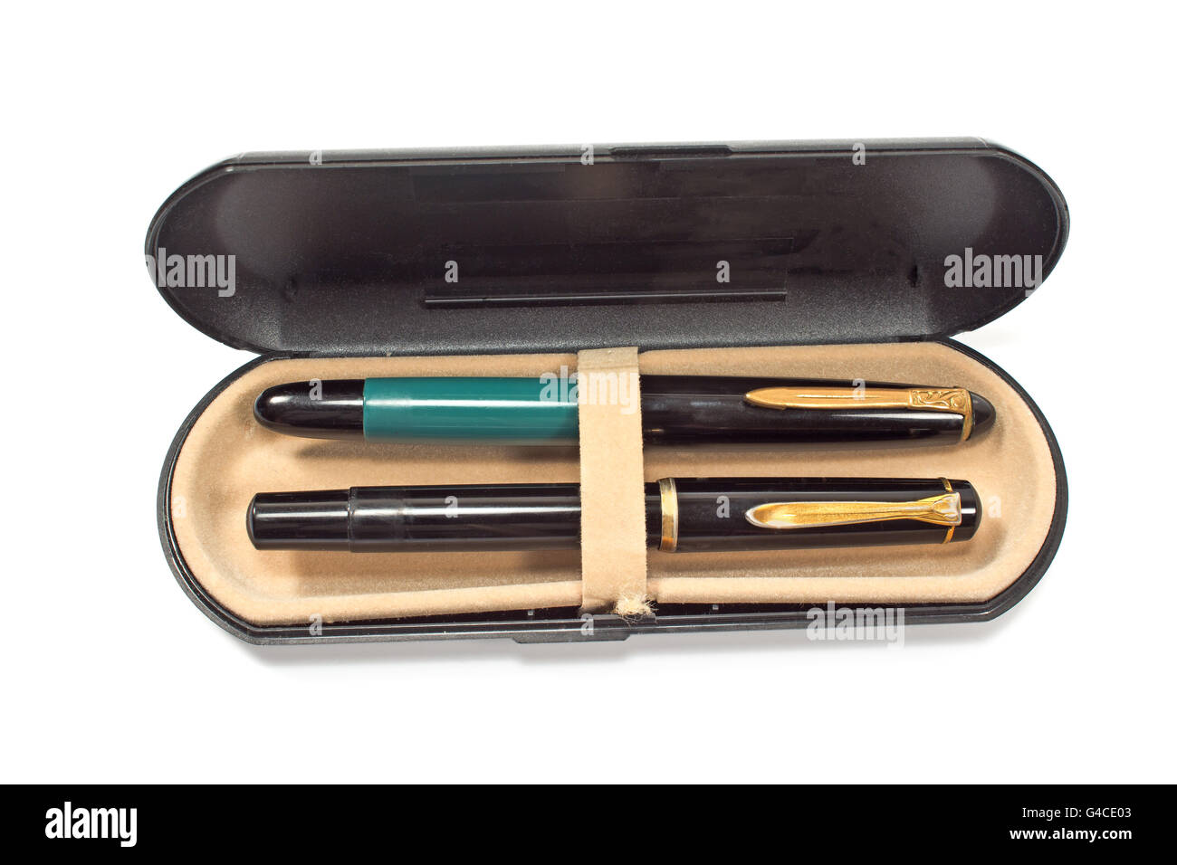 Vintage fountain pens in box isolated on white Stock Photo