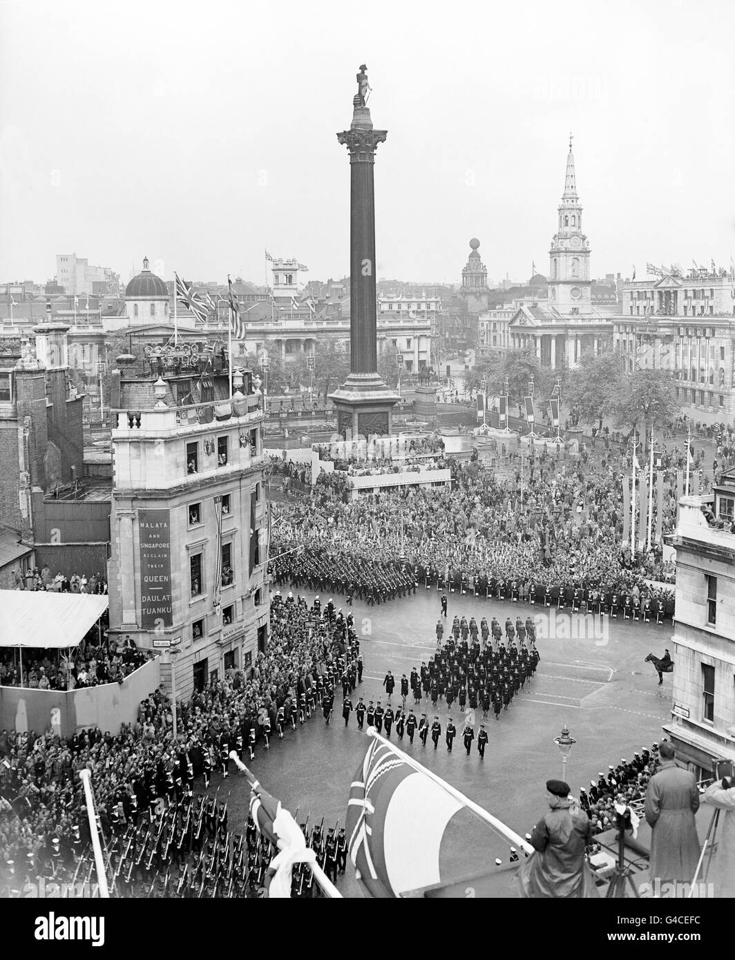 An aerial view of the Royal Navy followed by the Women's Royal Naval Service in the Coronation procession on the return from Westminster Abbey to Buckingham Palace after the crowning of Queen Elizabeth II. Stock Photo