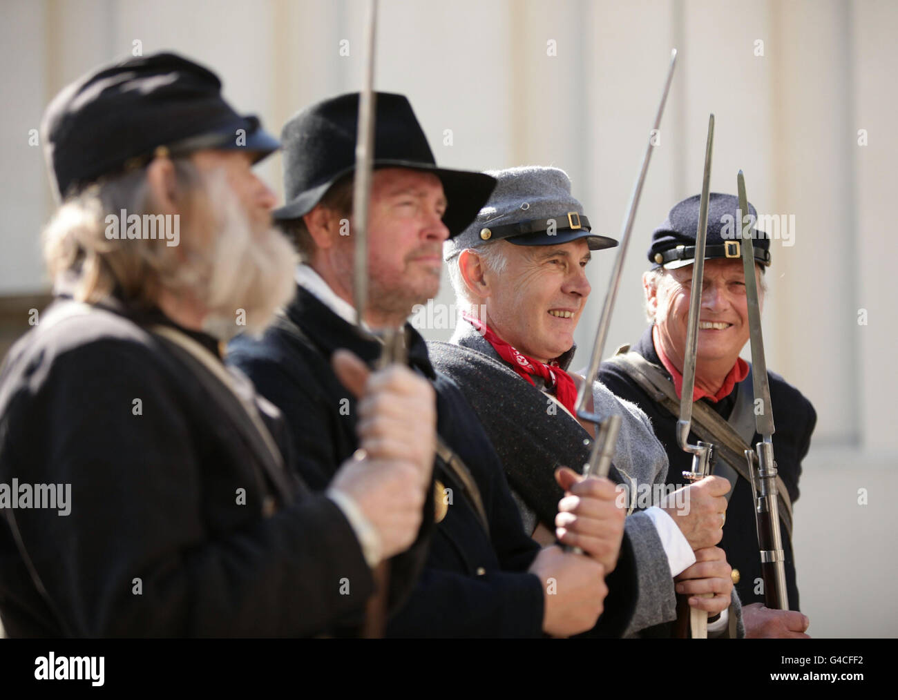 Members of The Southern Skirmish Association (SoSkAn) American Civil War Re-enactment Society who joined up with soldiers from the Grenadier Guards, during the launch of The British Military Tournament at Wellington Barracks in central London. Stock Photo