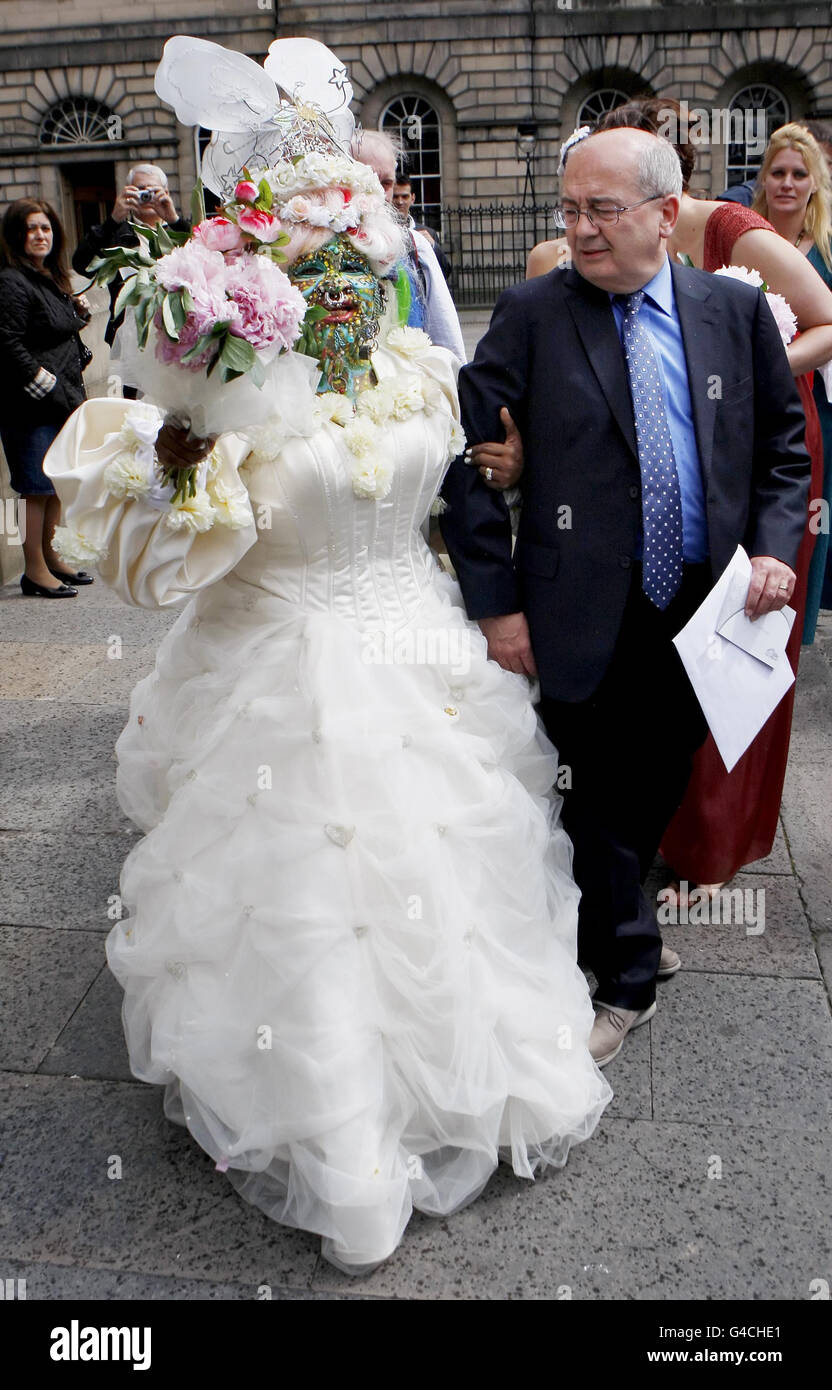 Elaine Davidson, who holds the record for World's Most Pierced Woman with 6,925 piercings, outside Edinburgh Registry Office following her wedding to an unnamed man. Stock Photo
