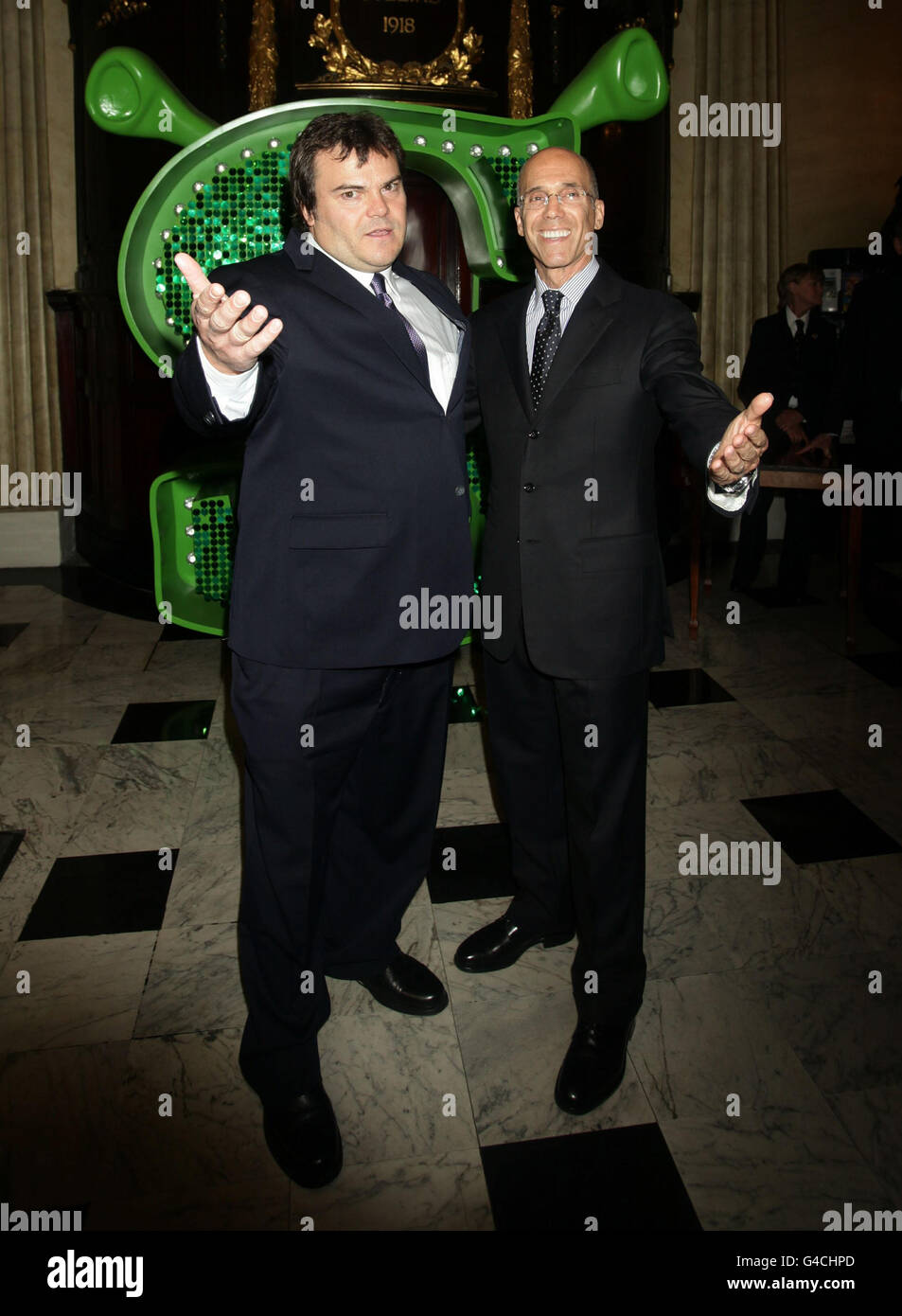 Jack Black (left) and Jeffrey Katzenberg, CEO of DreamWorks Animation arrive for a special performance of Shrek The Musical at the Theatre Royal in Drury Lane, London. Stock Photo