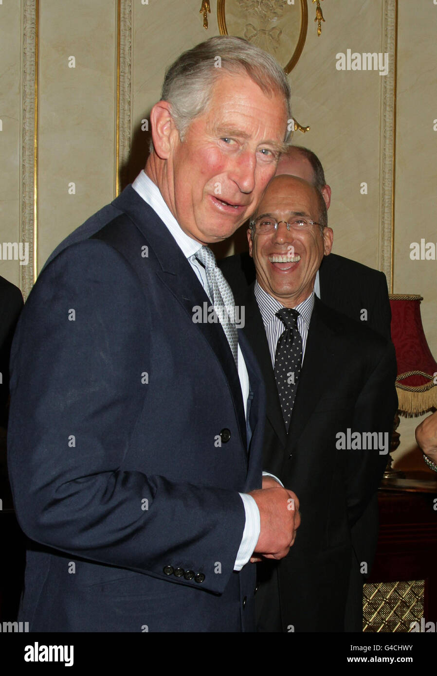 The Prince of Wales greets Jeffrey Katzenberg, CEO of DreamWorks Animation, at a special performance of Shrek The Musical at the Theatre Royal in Drury Lane, London. Stock Photo