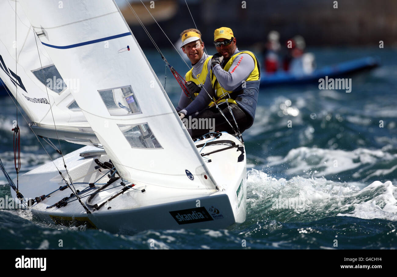 Brazil's Robert Scheidt and crew Bruno Prada win Gold in the Star class during day six of the Skandia Sail for Gold Regatta in Weymouth, Dorset. Stock Photo